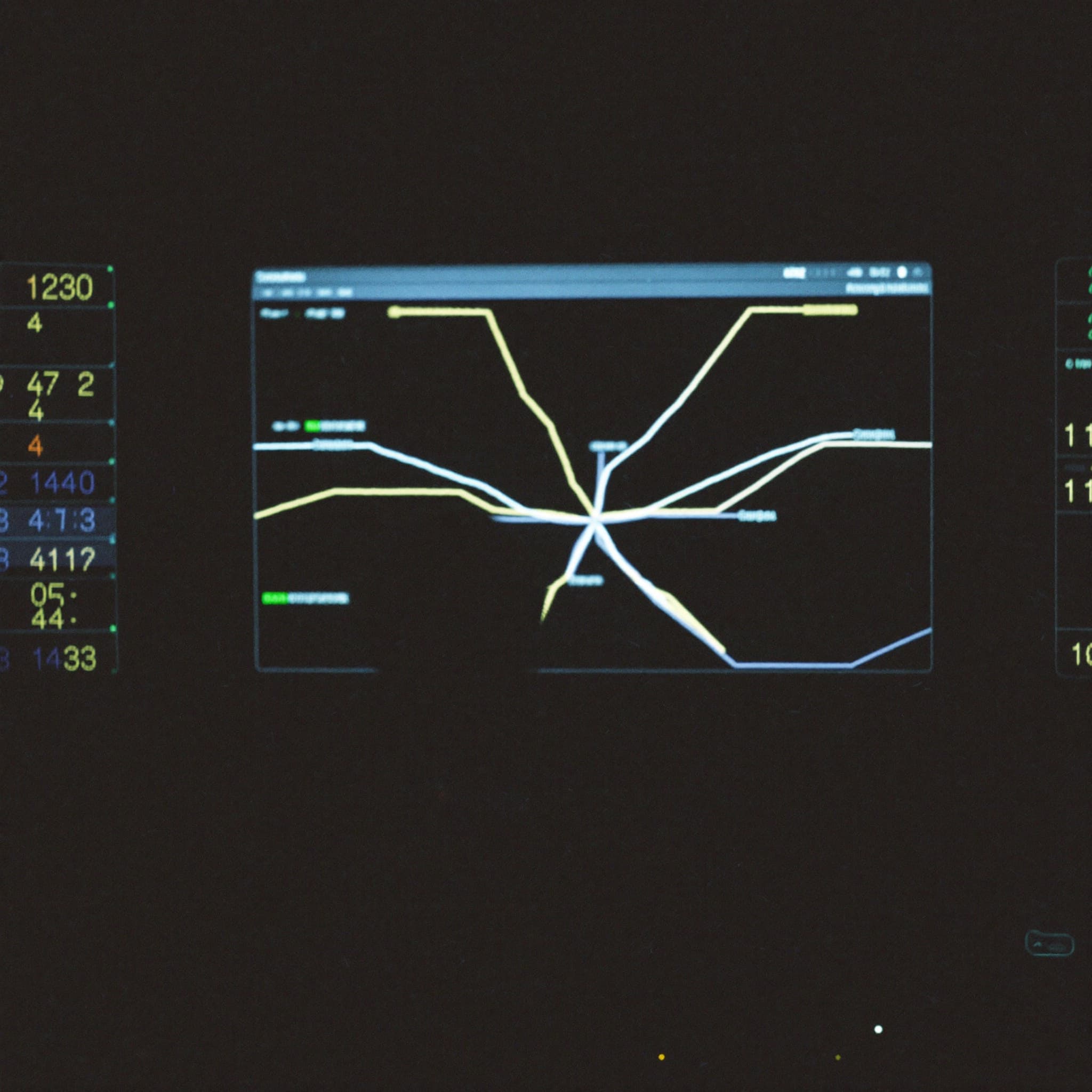 Grid control room with a network map on the screens