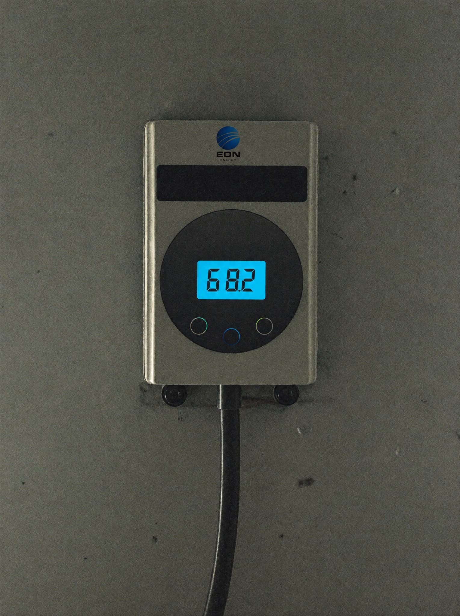 Smart electricity meter on the wall of a home